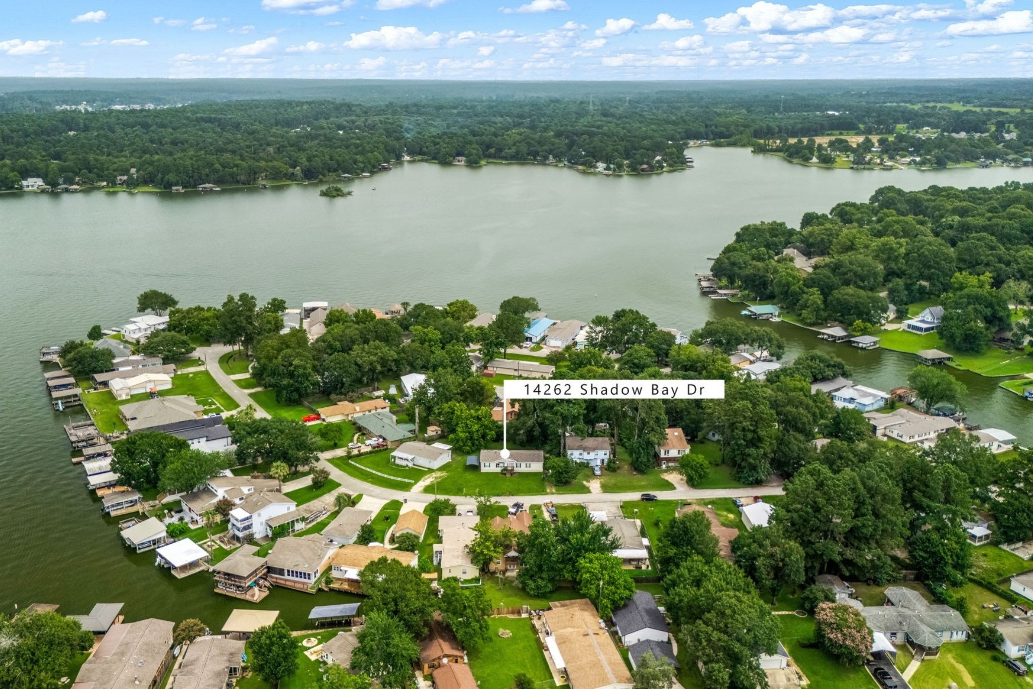 14262 Shadow Bay Drive Willis, TX 77318 - Photo 22 of 26 a view of lake