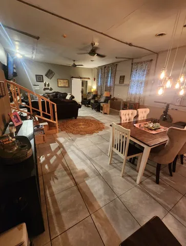 a kitchen with a stove and a refrigerator