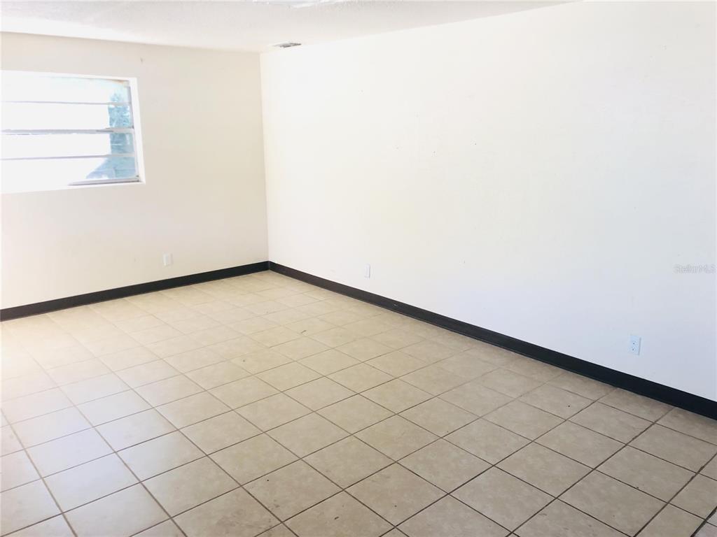 1584 Primrose Lane Daytona Beach, FL 32117 - Photo 3 of 8 a view of a room