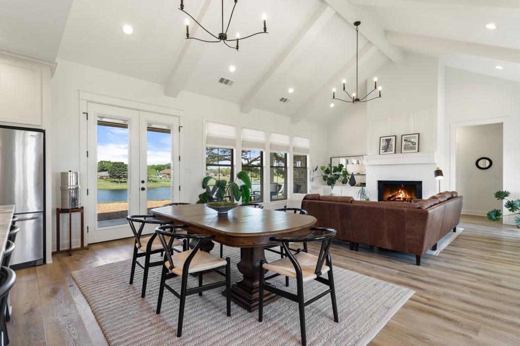 23630 Champion Drive Lindale, TX 75771 - Photo 6 of 36 a view of a dining room with furniture window and wooden floor