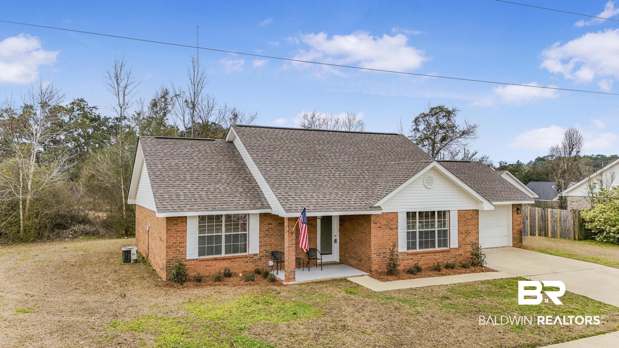 16330 Absalom Street Foley, AL 36535 - Photo 2 of 42 Single story home with central AC, a garage, covered porch, and a front lawn