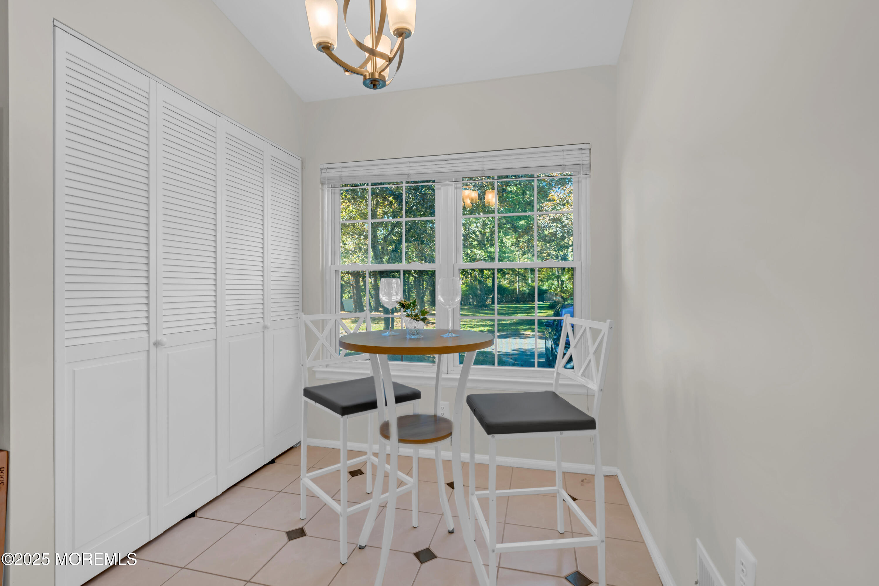 59 Boxwood Terrace Red Bank, NJ 07701 - Photo 11 of 46 a kitchen with a sink cabinets and a window