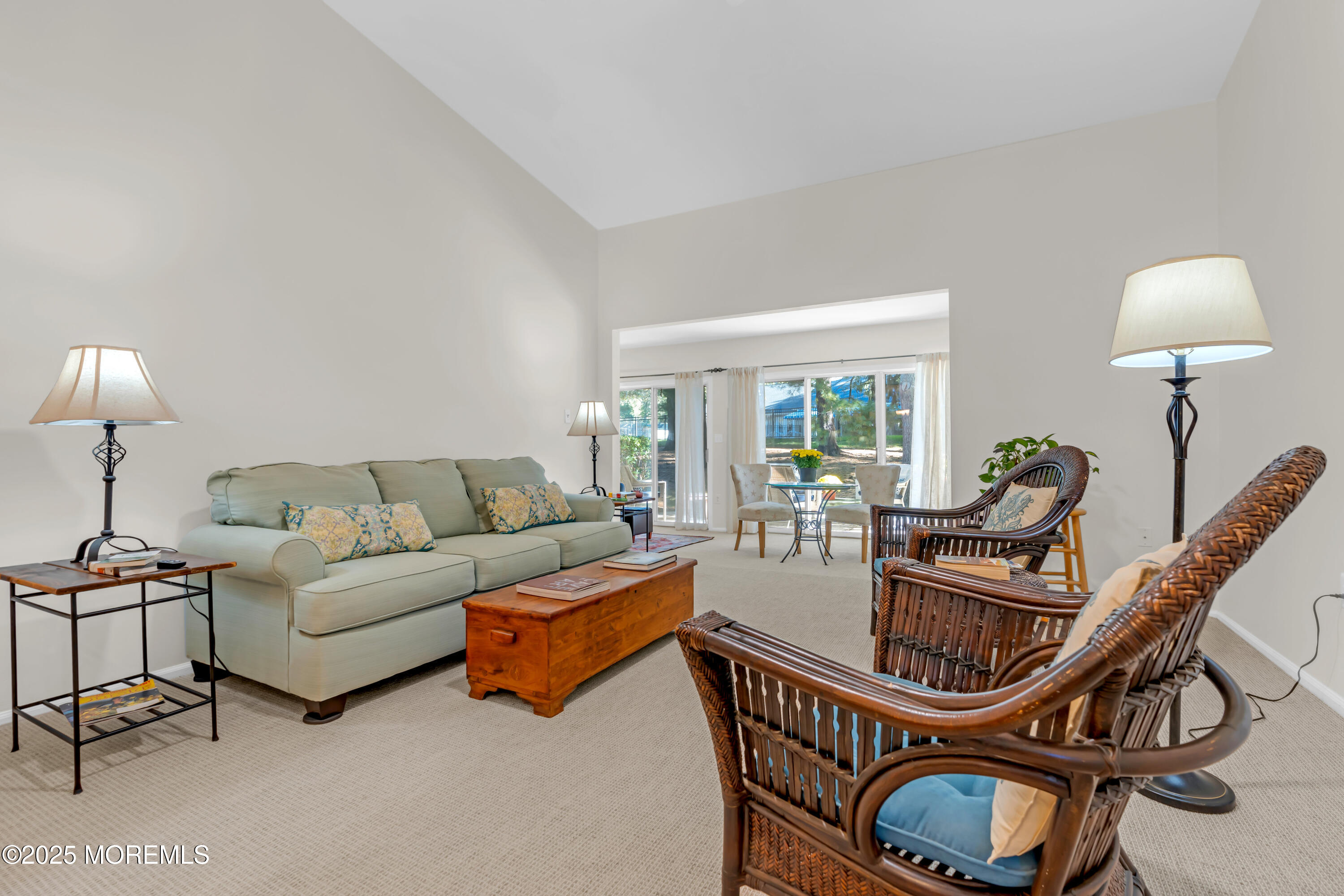 59 Boxwood Terrace Red Bank, NJ 07701 - Photo 20 of 46 a living room with furniture a lamp and a window