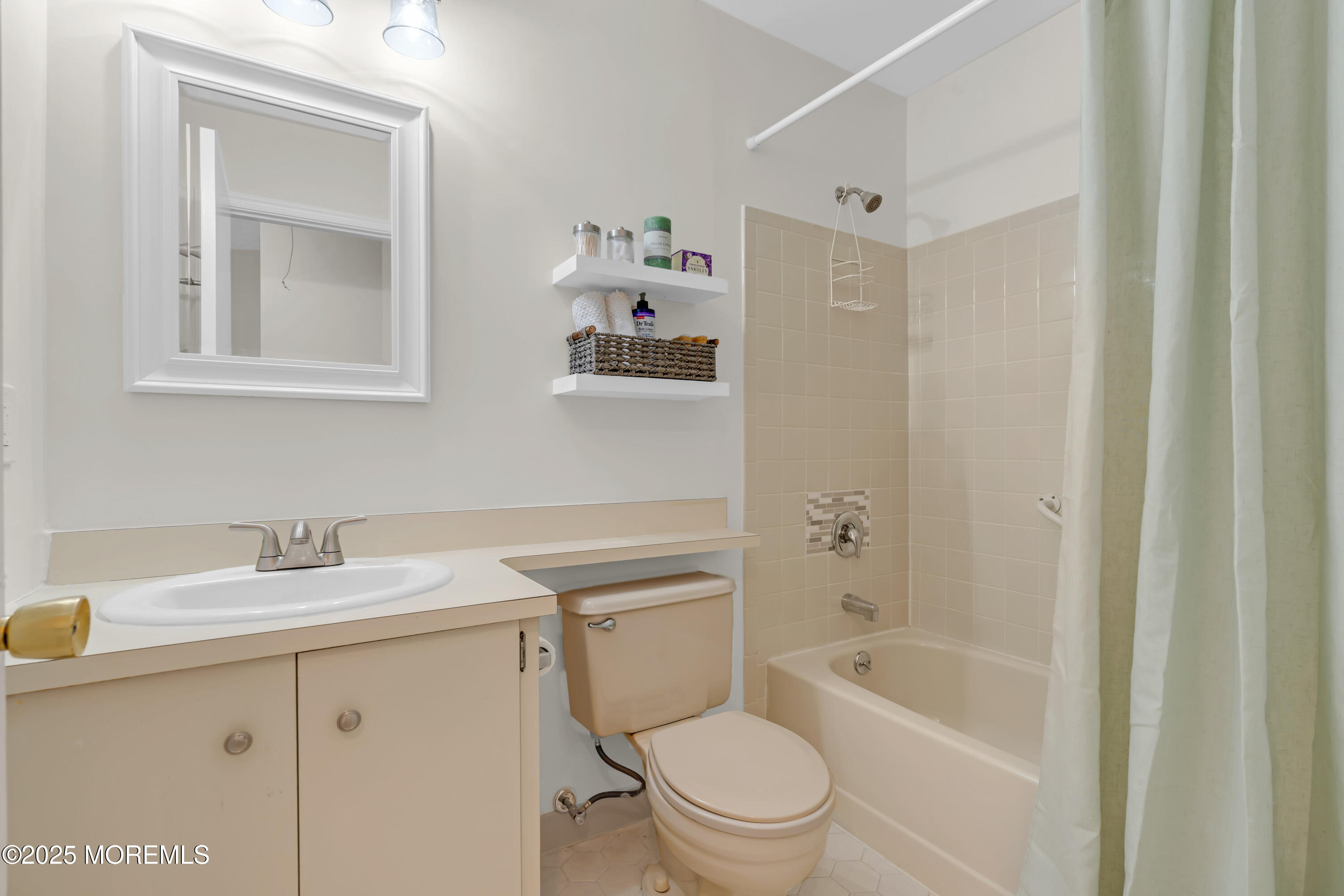 59 Boxwood Terrace Red Bank, NJ 07701 - Photo 27 of 46 a bathroom with a sink a toilet and shower