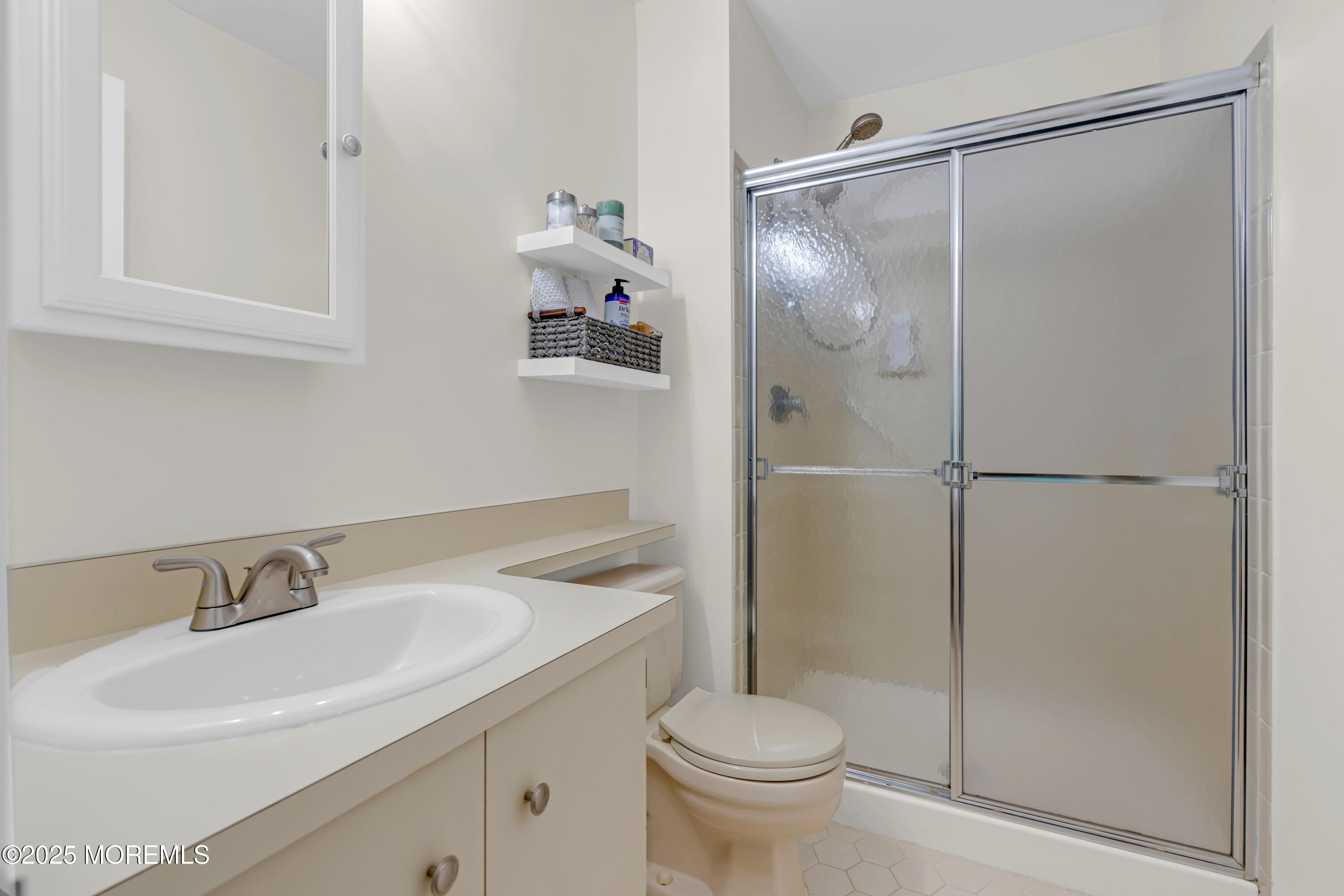 59 Boxwood Terrace Red Bank, NJ 07701 - Photo 33 of 46 a bathroom with a granite countertop sink toilet and shower