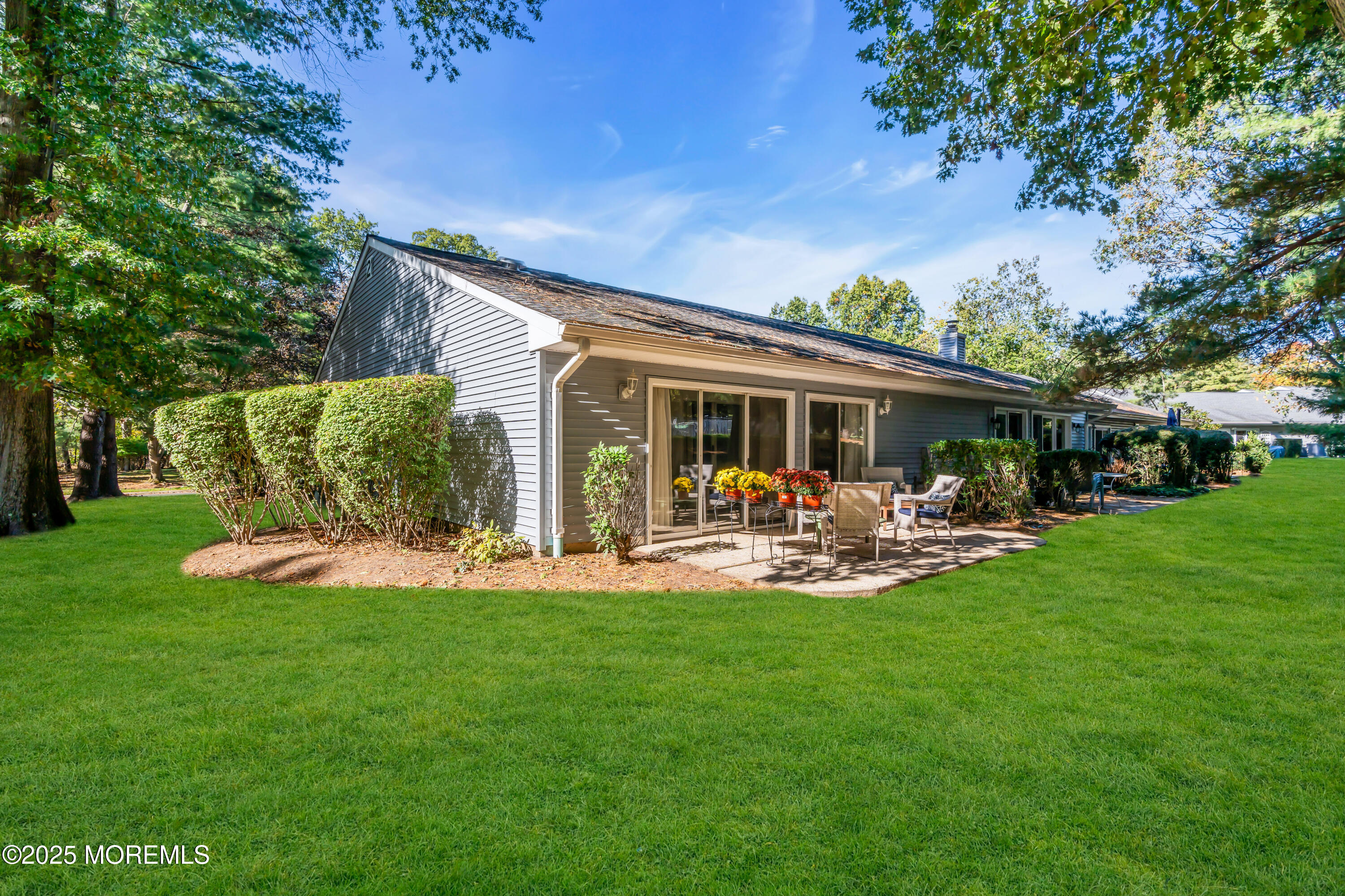 59 Boxwood Terrace Red Bank, NJ 07701 - Photo 37 of 46 a front view of a house with backyard and sitting area