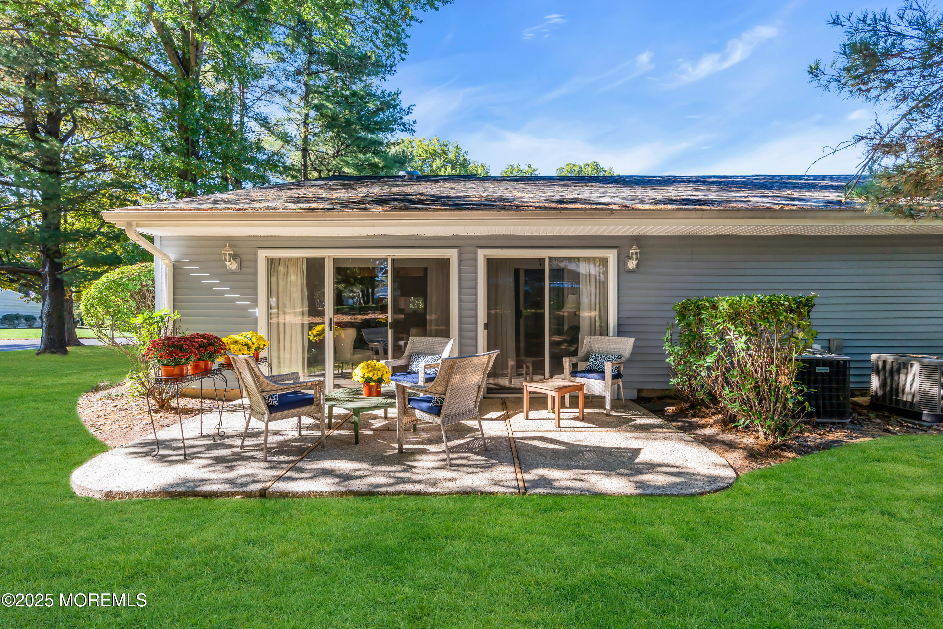 59 Boxwood Terrace Red Bank, NJ 07701 - Photo 38 of 46 a view of a house with backyard sitting area and garden