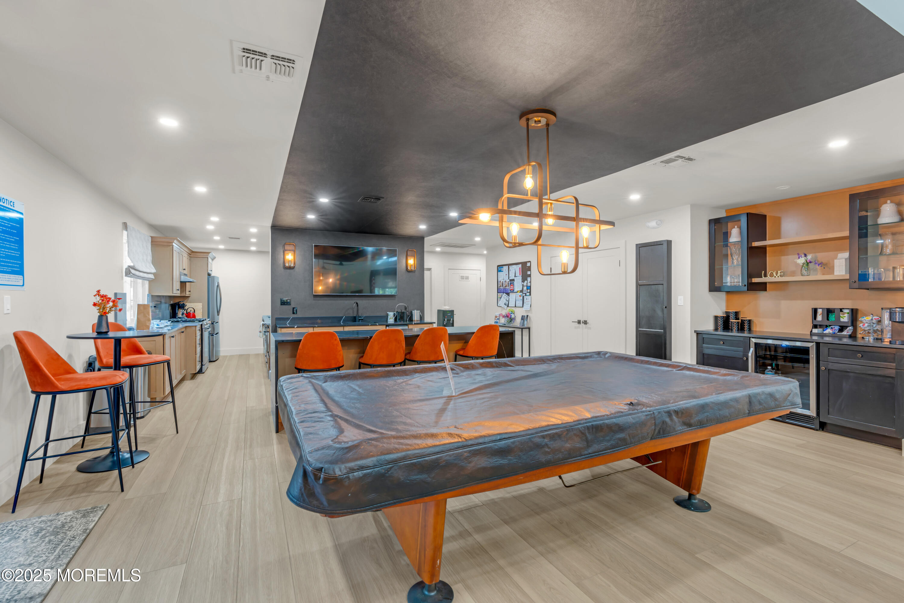 59 Boxwood Terrace Red Bank, NJ 07701 - Photo 44 of 46 a room with wooden floor and pool table