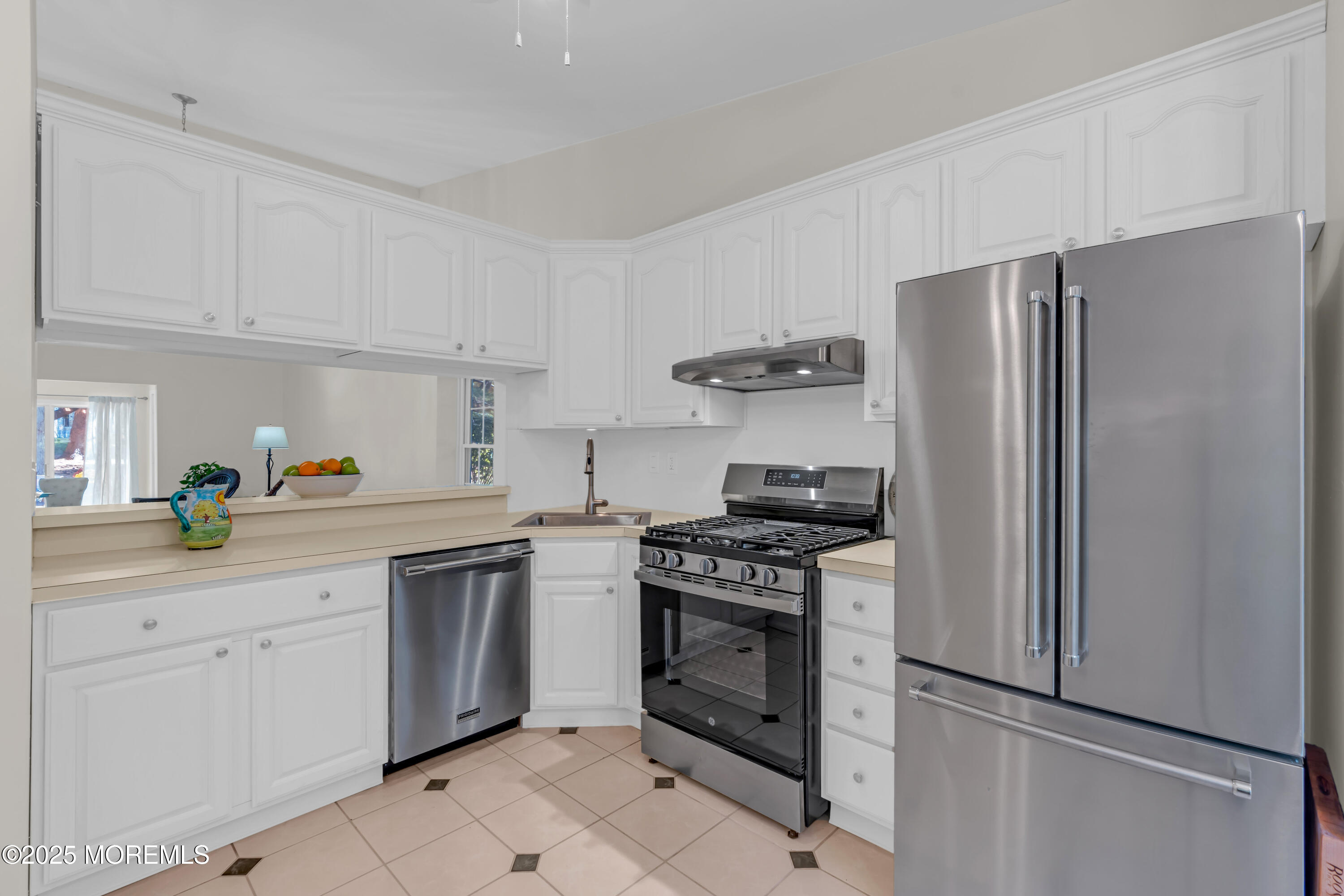 59 Boxwood Terrace Red Bank, NJ 07701 - Photo 10 of 46 a kitchen with stainless steel appliances granite countertop a refrigerator sink and stove