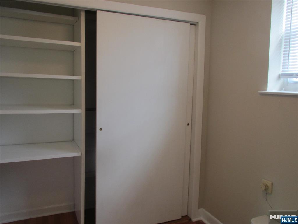 126 Hastings Avenue, Unit A Rutherford, NJ 07070 - Photo 8 of 11 a view of walk in closet with window