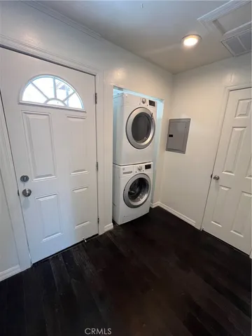 a view of a livingroom with wooden floor
