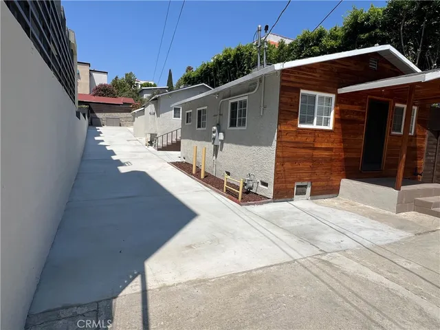 a view of a house with a patio