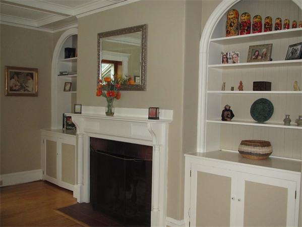 a kitchen with a cabinets and a fireplace