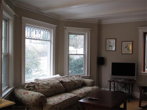 39 Brook Hill Road Milton, MA 02186 - Photo 2 of 9 a living room with furniture and a flat screen tv