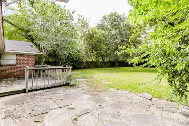 a view of an outdoor space with swimming pool