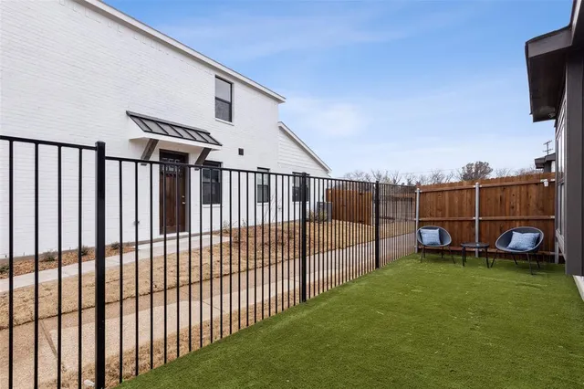a view of a backyard with a garden