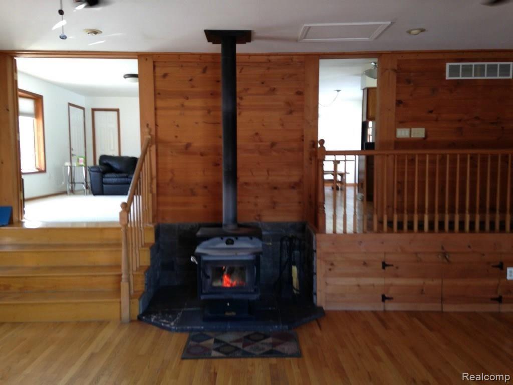 1375 West Marr Road Howell, MI 48855 - Photo 11 of 34 Wood Burner