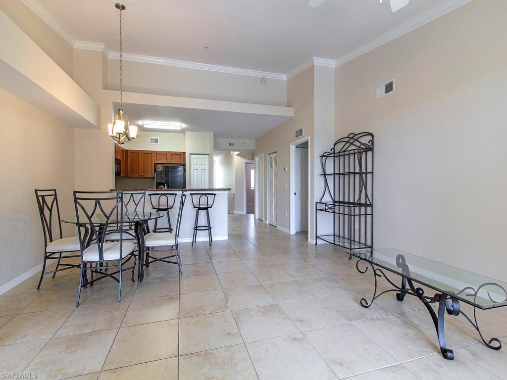 Undisclosed Address Estero, FL 33928 - Photo 2 of 14 a dining room with furniture and a window