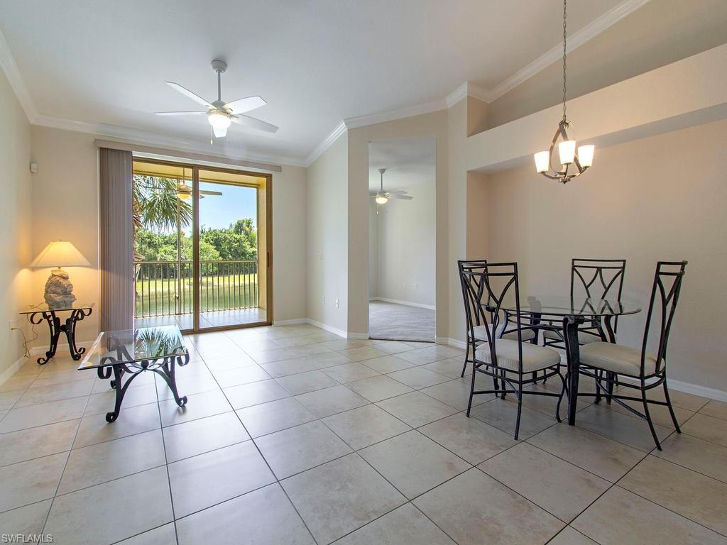 Undisclosed Address Estero, FL 33928 - Photo 3 of 14 a view of a dining room with furniture window and outside view