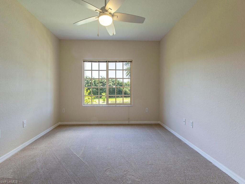 Undisclosed Address Estero, FL 33928 - Photo 6 of 14 an empty room with a window