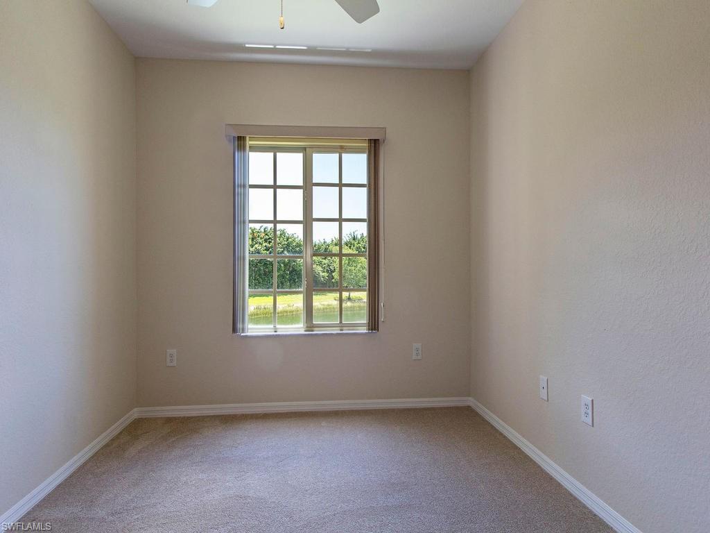 Undisclosed Address Estero, FL 33928 - Photo 10 of 14 an empty room with a window