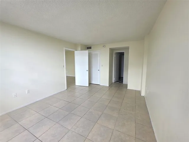 an empty room with a natural light