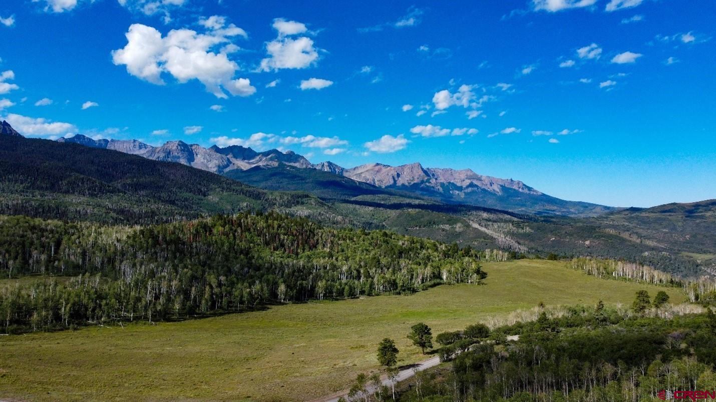 9757 County Road 5 Ridgway, CO 81432 - Photo 12 of 15 a view of a golf course with a lake