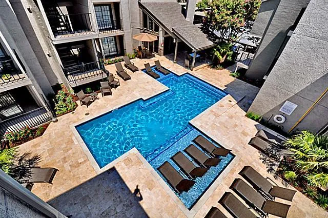 wooden floor with furniture and a book shelf