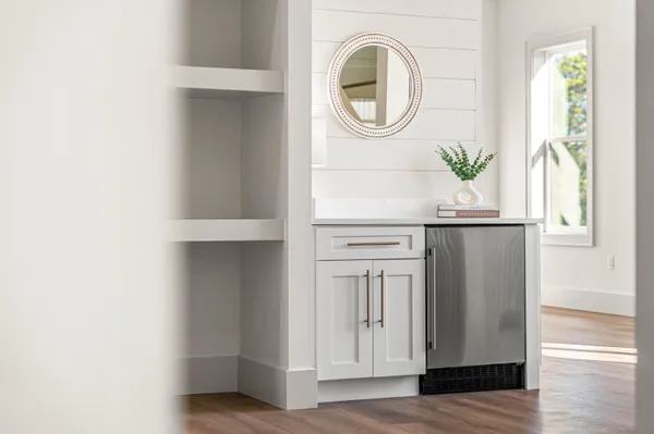 a bathroom with a bathtub and window