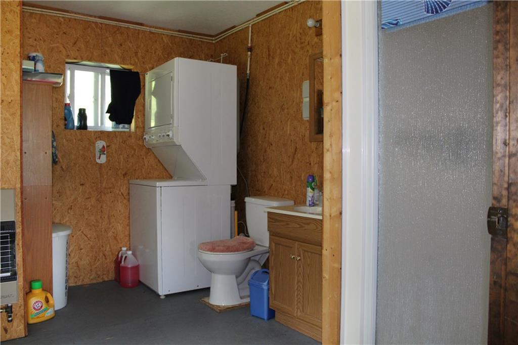 585 Old Spencer Road West Forks, ME 04985 - Photo 14 of 33 Full bathroom including washer and...