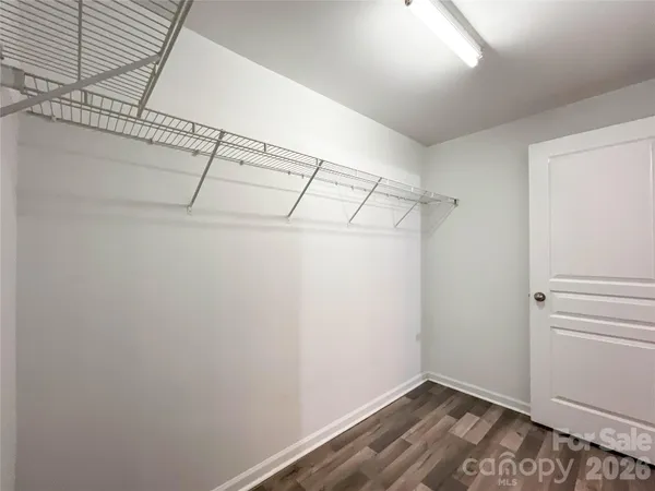 a view of a room with racks on the wall