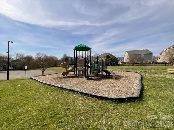 a view of a garden with a slide