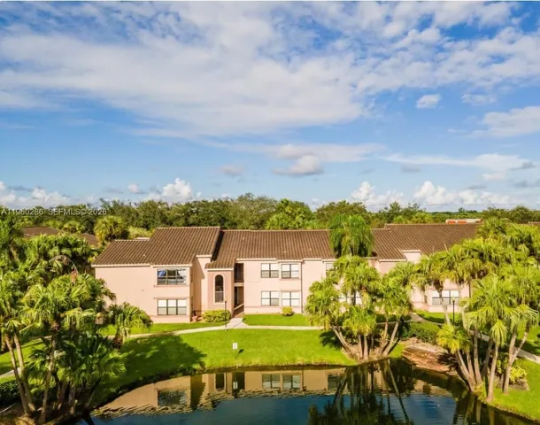 aerial view of a house with a garden