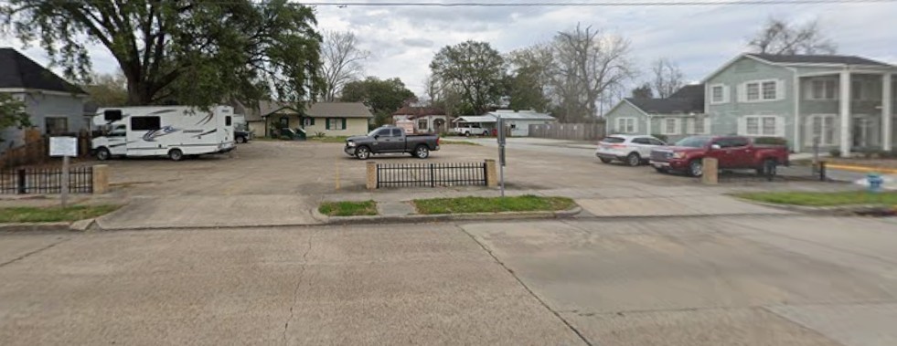 a view of a street with cars