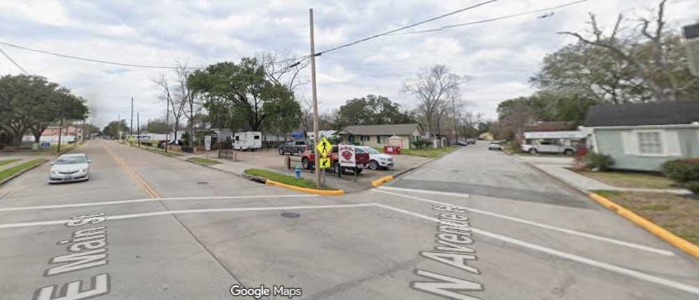 819 East Main Street Humble, TX 77338 - Photo 2 of 4 a view of a street with cars