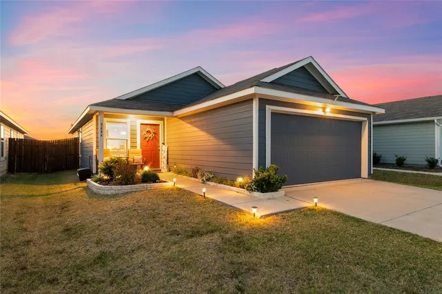 a front view of house with yard