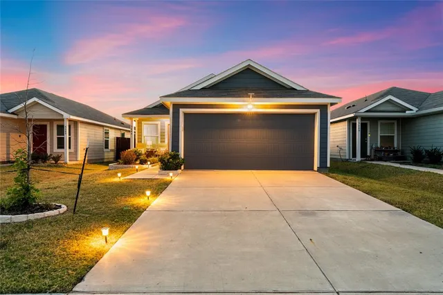 a front view of a house with swimming pool