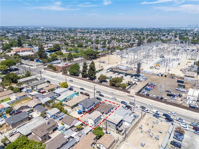 an aerial view of a city with lots of residential buildings