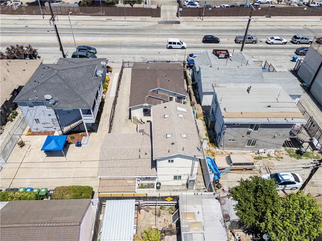 a view of multiple houses with outdoor space