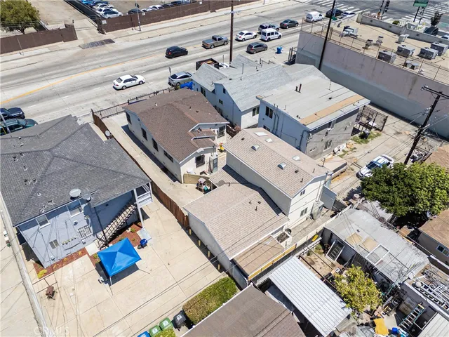 an aerial view of a house with a ocean view
