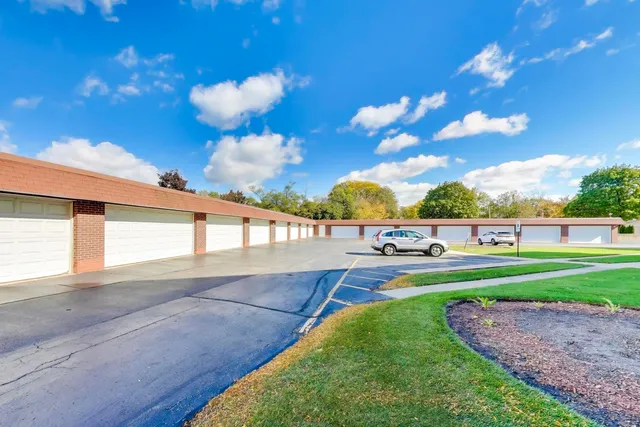 a view of street with parked cars