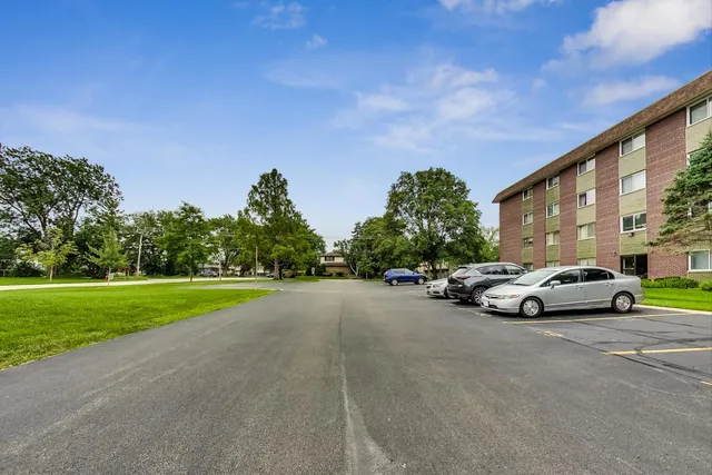 a house with swimming pool in front of it