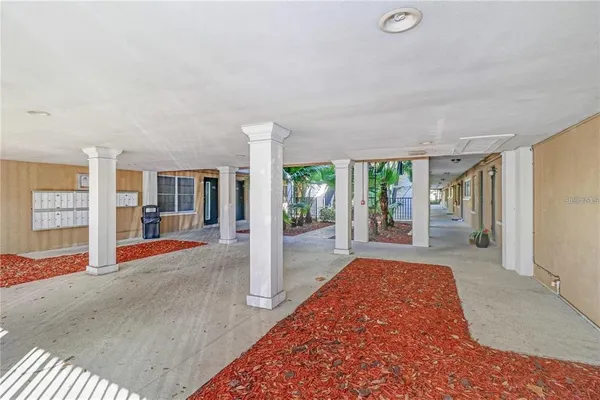 a view of a room with large windows