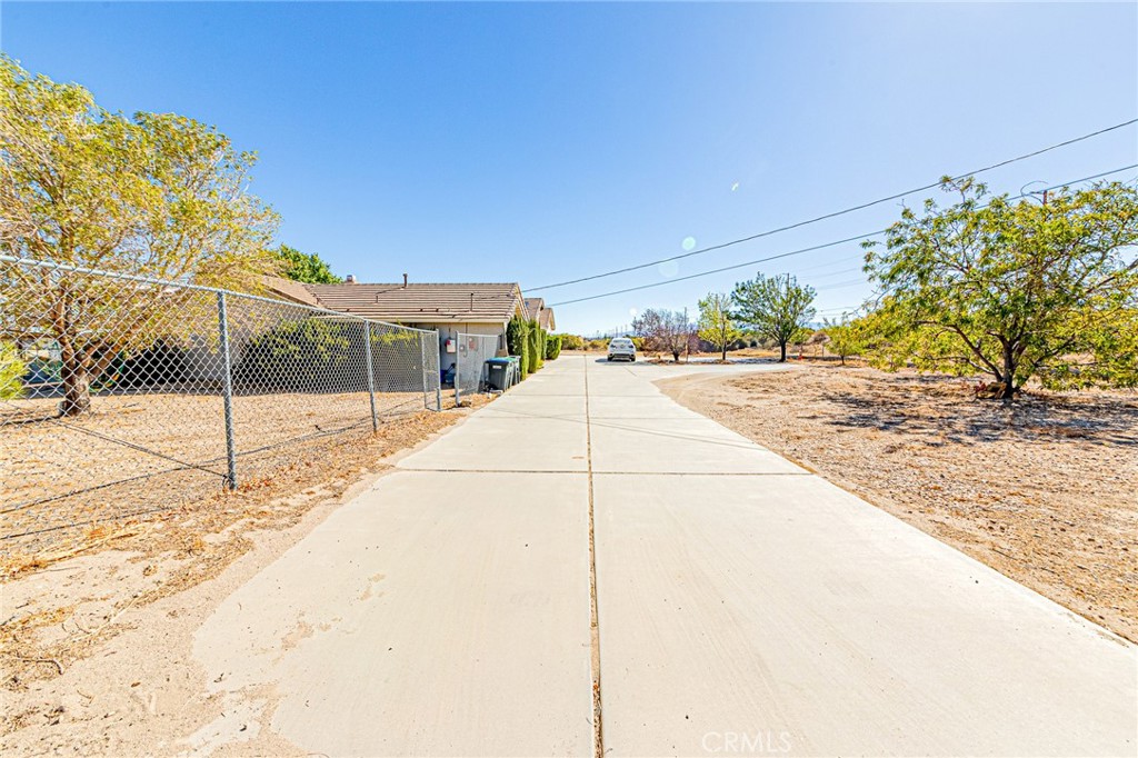 9922 Phelan Road Oak Hills, CA 92344 - Photo 23 of 30 a view of a backyard of the house