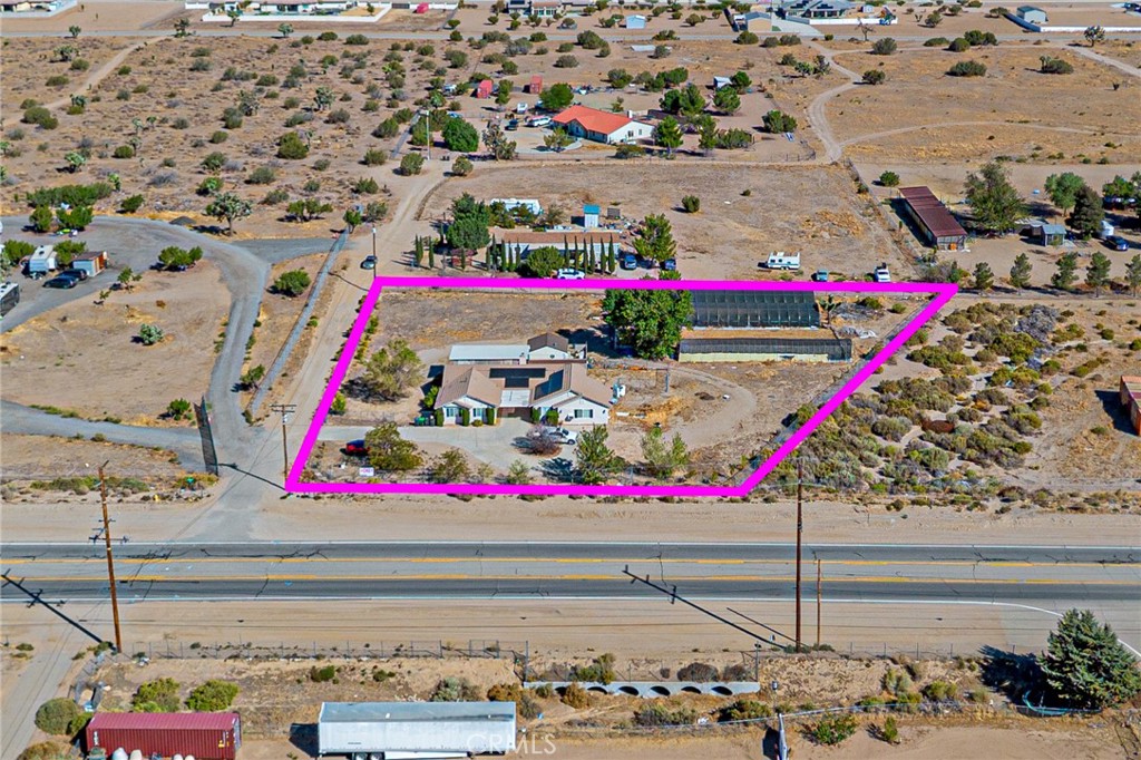 9922 Phelan Road Oak Hills, CA 92344 - Photo 25 of 30 a view of swimming pool with an outdoor seating