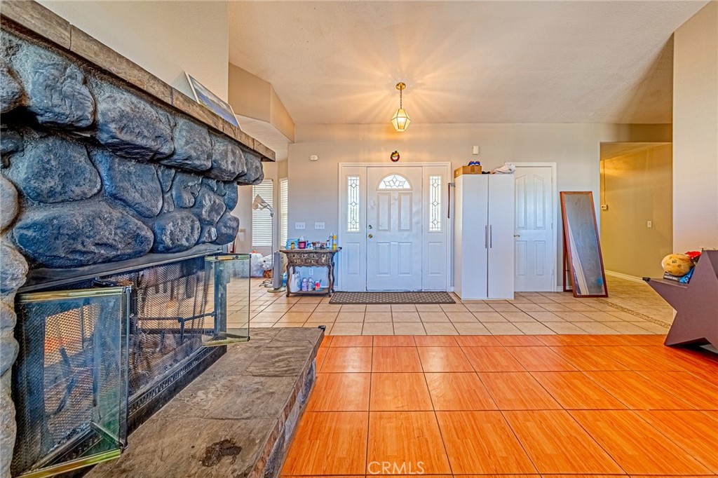 9922 Phelan Road Oak Hills, CA 92344 - Photo 6 of 30 a view of a gallery with wooden floor