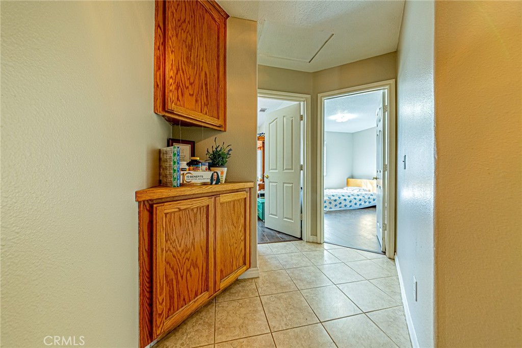 9922 Phelan Road Oak Hills, CA 92344 - Photo 10 of 30 a bathroom with a sink and a mirror