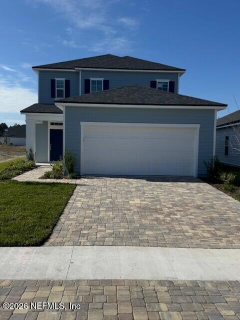 91 Chestnut Grv Road St. Augustine, FL 32092 - Photo 1 of 17 a front view of a house with a yard