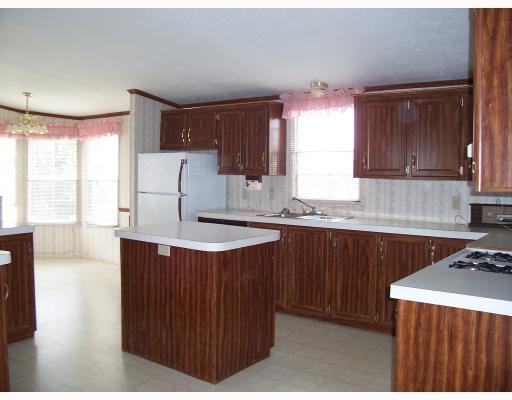 Kitchen. Open floor plan to familyroom and breakfast nook