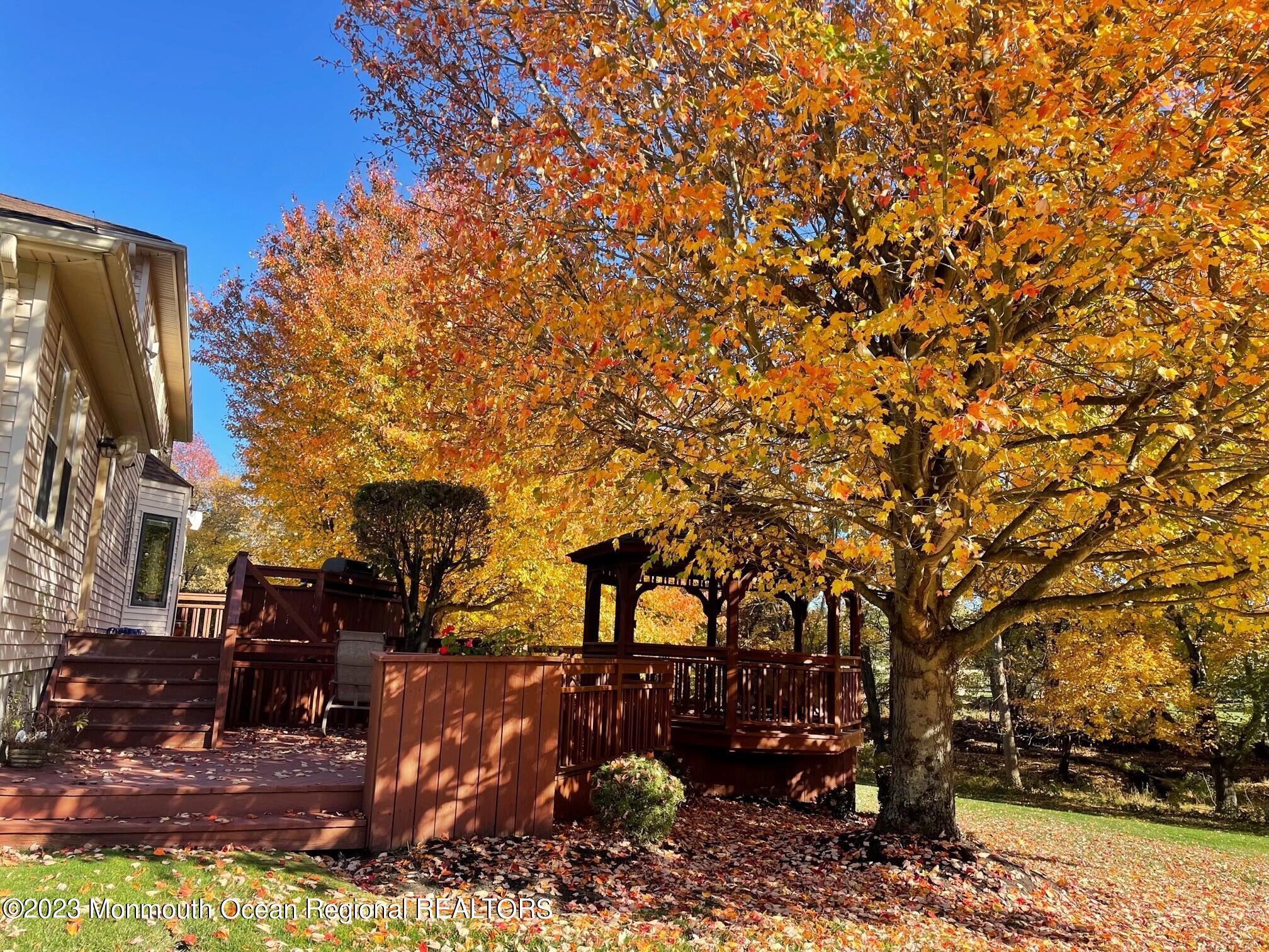 14 Nancy Road Marlboro, NJ 07746 - Photo 40 of 43 14 nancy view of deck in fall